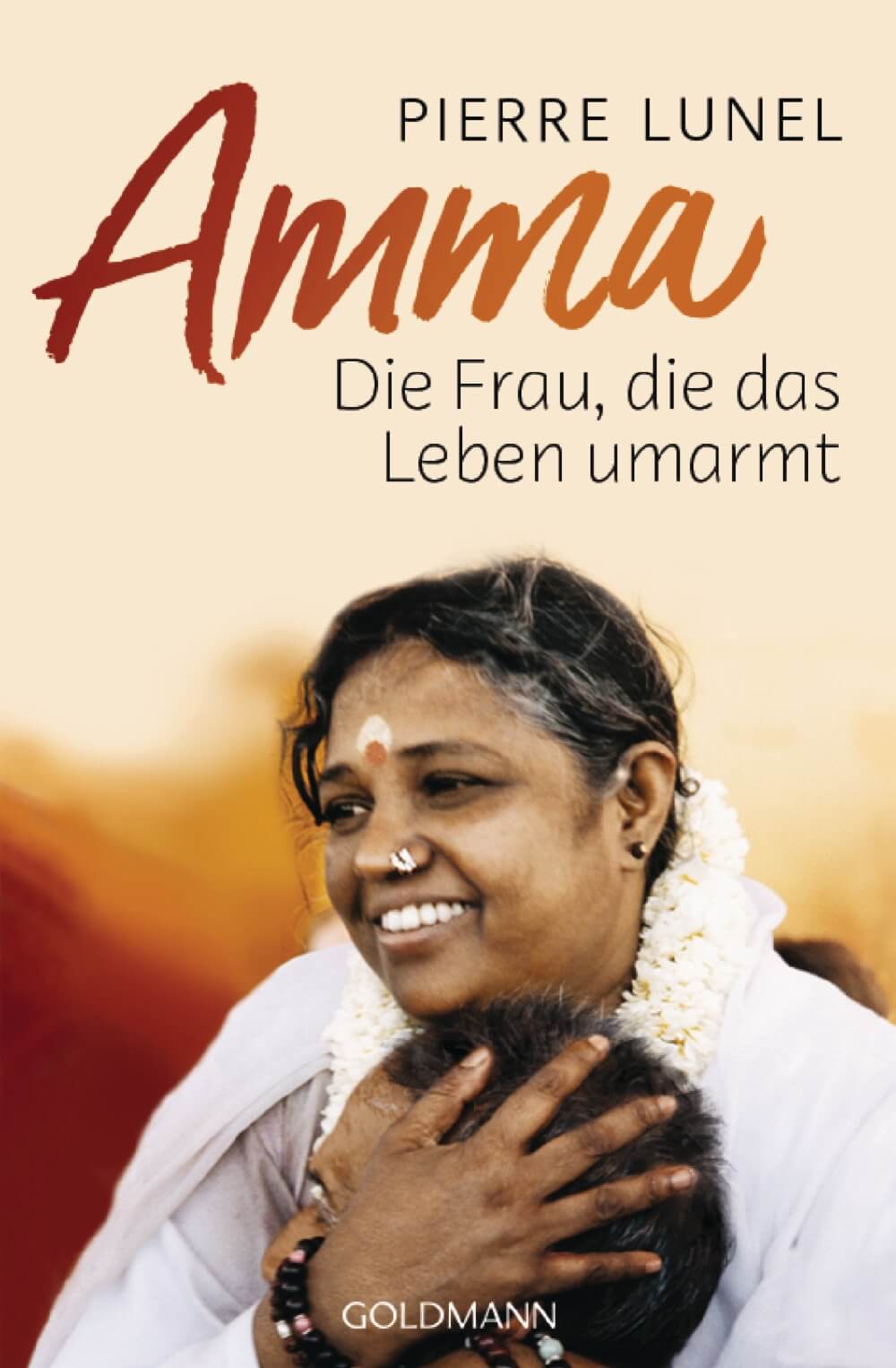 Amma, die Frau die das Leben umarmt